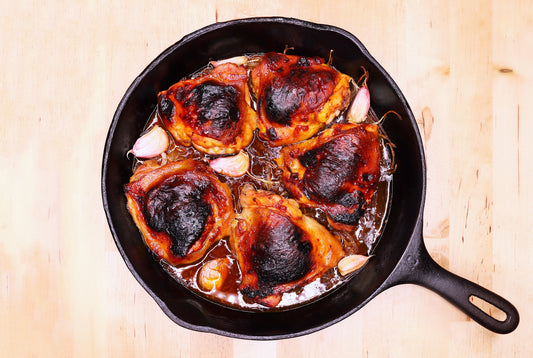 chicken thighs in a pan