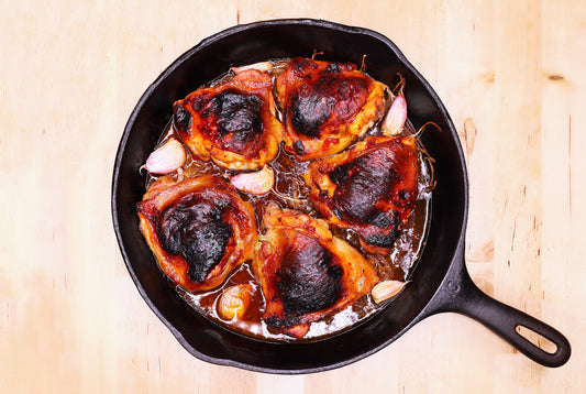 chicken thighs in a pan