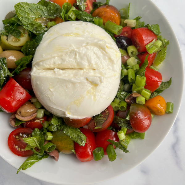 burrata and tomato and olive salad
