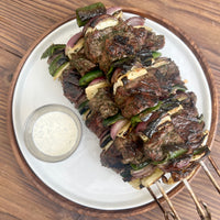 grilled lamb kebab with fennel and peppers