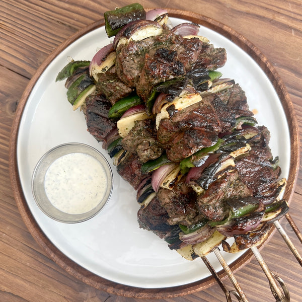 grilled lamb kebab with fennel and peppers