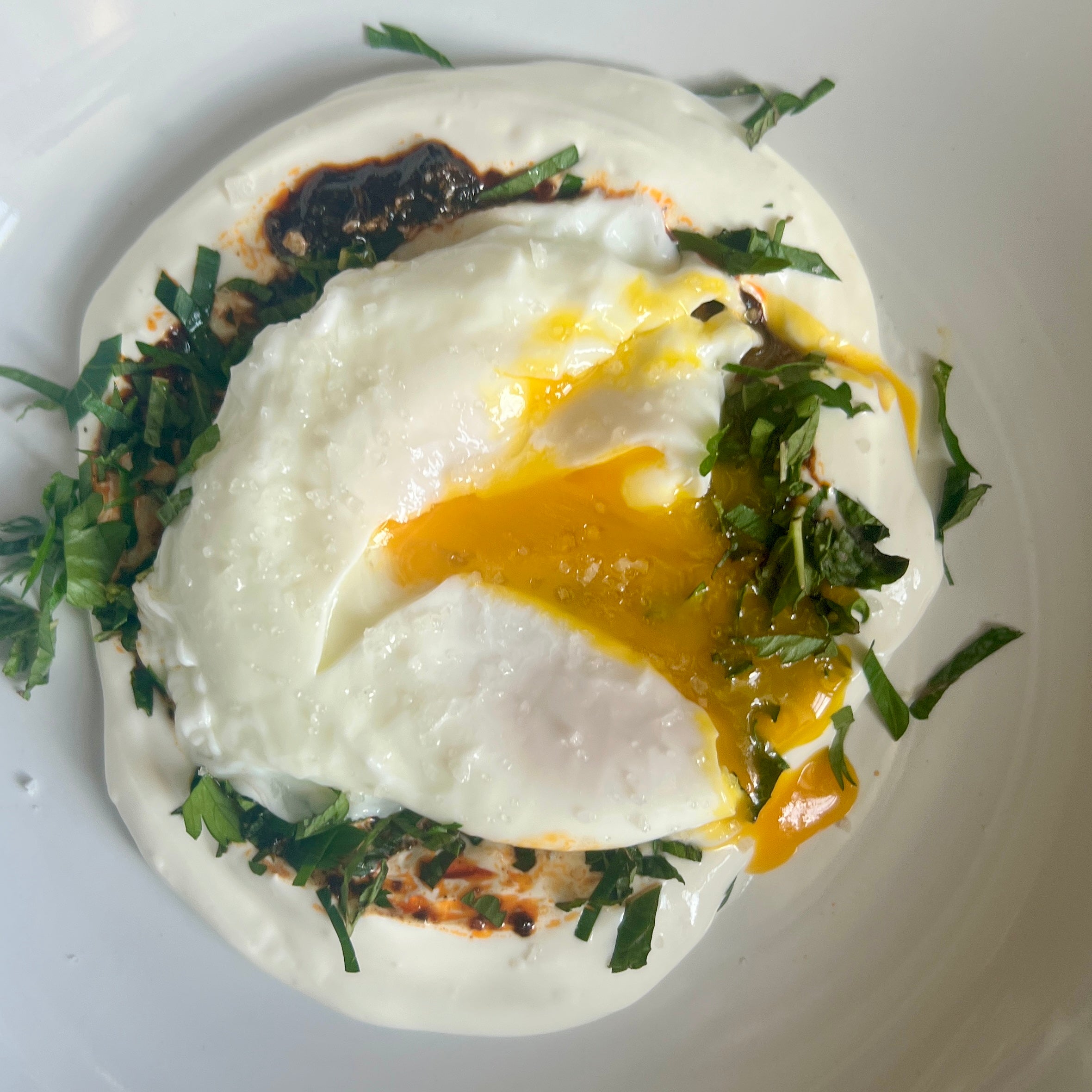 poached egg labne harissa honey fleur de sel
