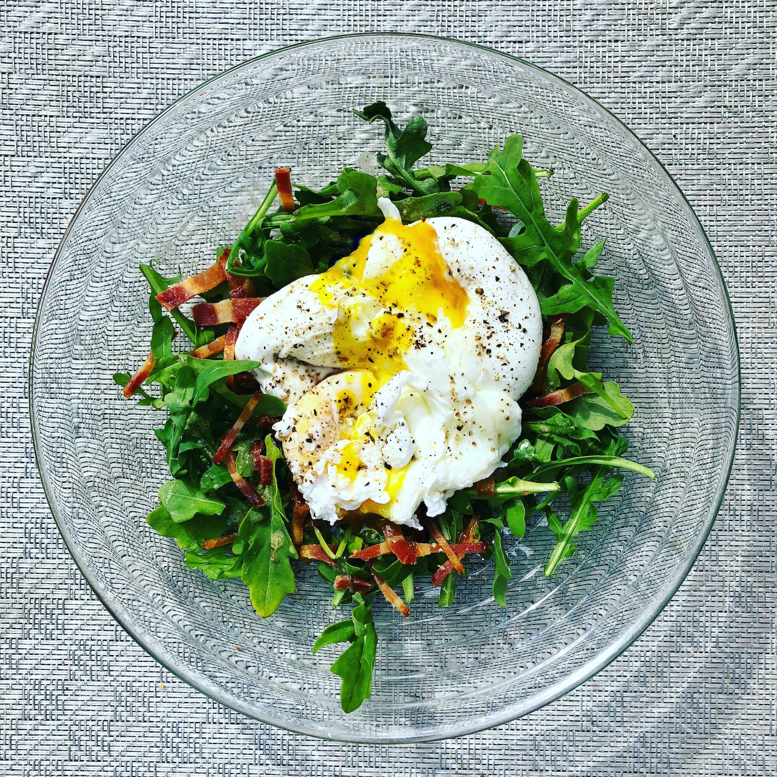 Arugula salad with poached egg